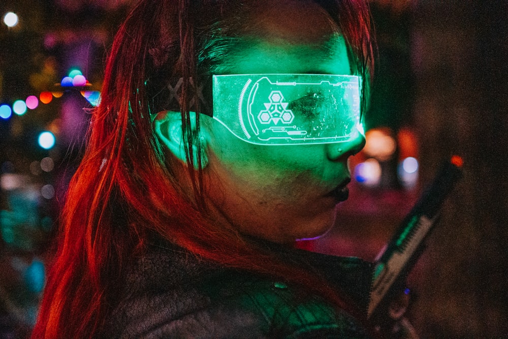 a woman wearing a pair of glowing glasses