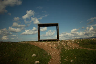 A cinematic frame showcasing a dramatic outdoor portrait with natural light.
