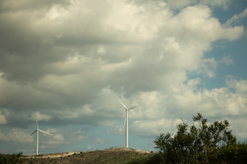 A wind turbine farm on a hillside.