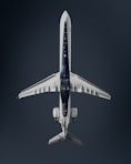 a large jetliner flying through a dark sky