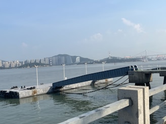 A waterfront project under construction, showcasing sturdy piers and retaining walls.