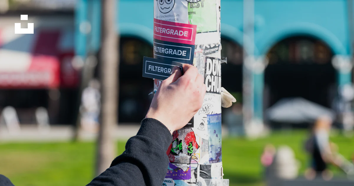 Sticker Pole In House A person is putting stickers on a pole photo β Free Cali Image on Unsplash