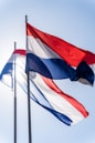 a couple of flags that are flying in the air
