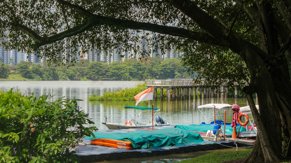 there is a boat that is docked on the water