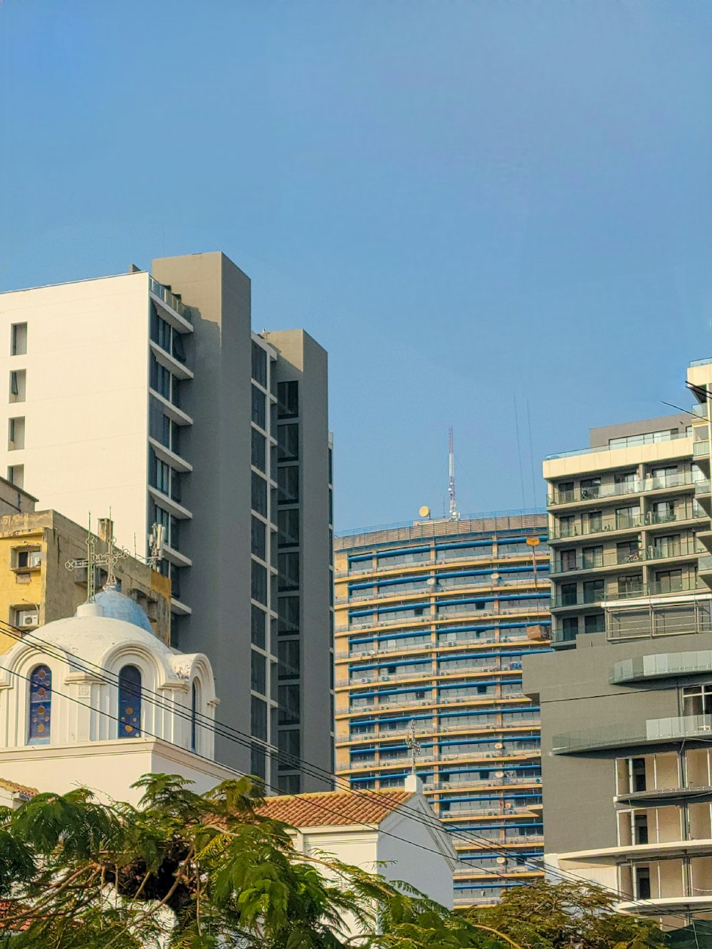 a view of a city with tall buildings