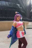 a woman dressed in a costume posing for a picture