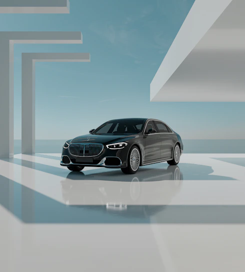 A sleek, elegant car parked in a minimalist urban setting with soft natural light.