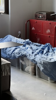 A rolling storage chest in a cozy living room.