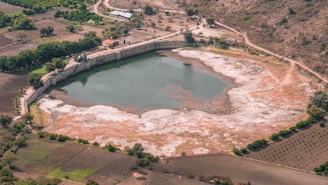 A modern water reservoir with pipelines and infrastructure.