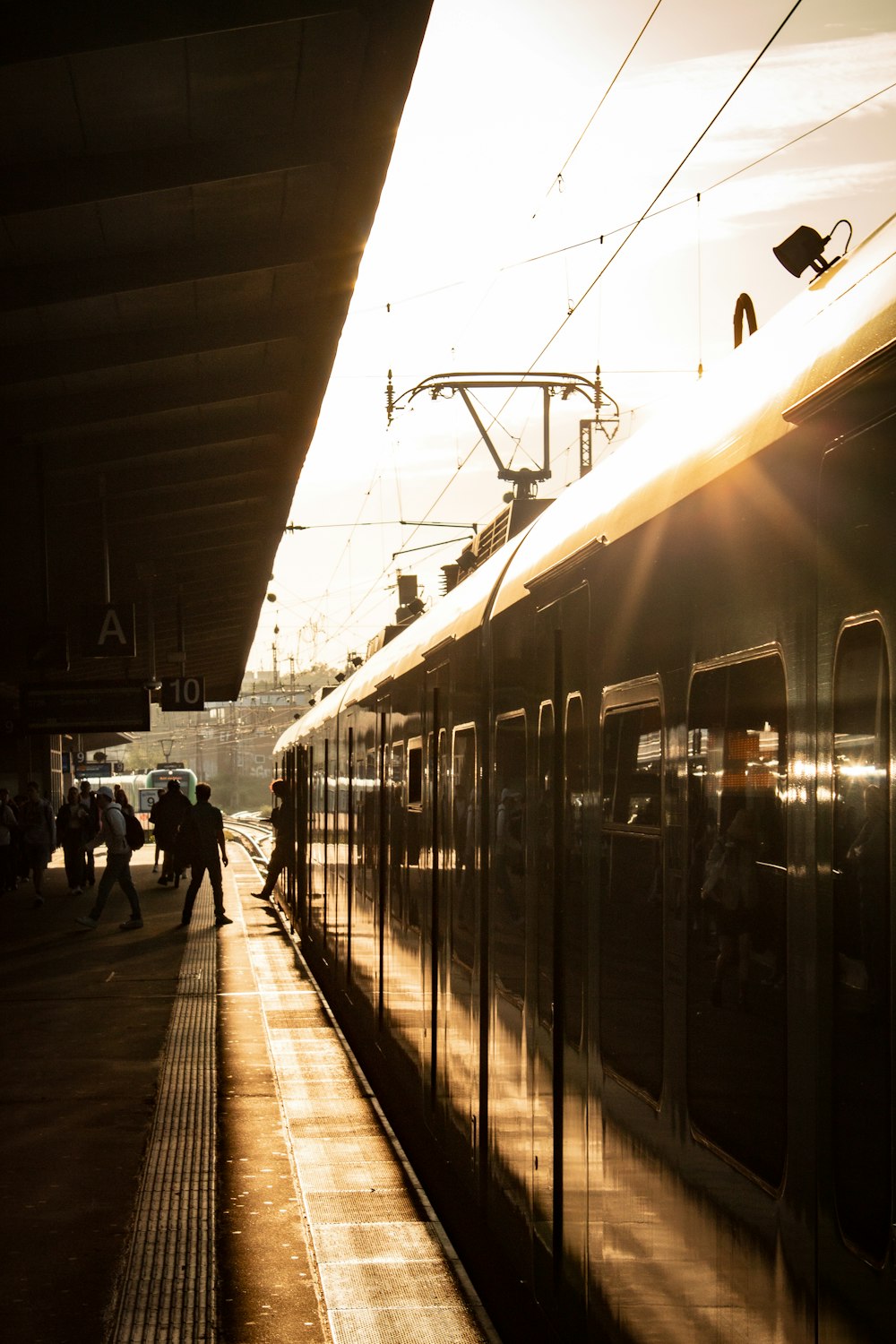 a train parked at a train station next to a platform