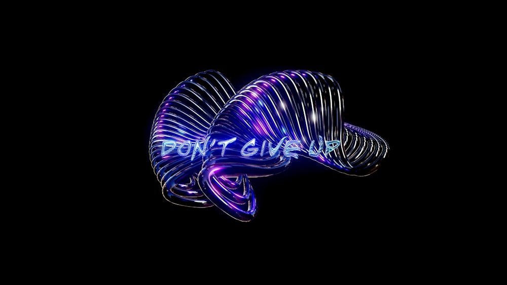 a neon fish with the words don't give up on it