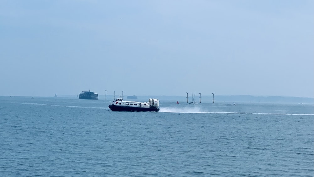 a large boat traveling across a large body of water