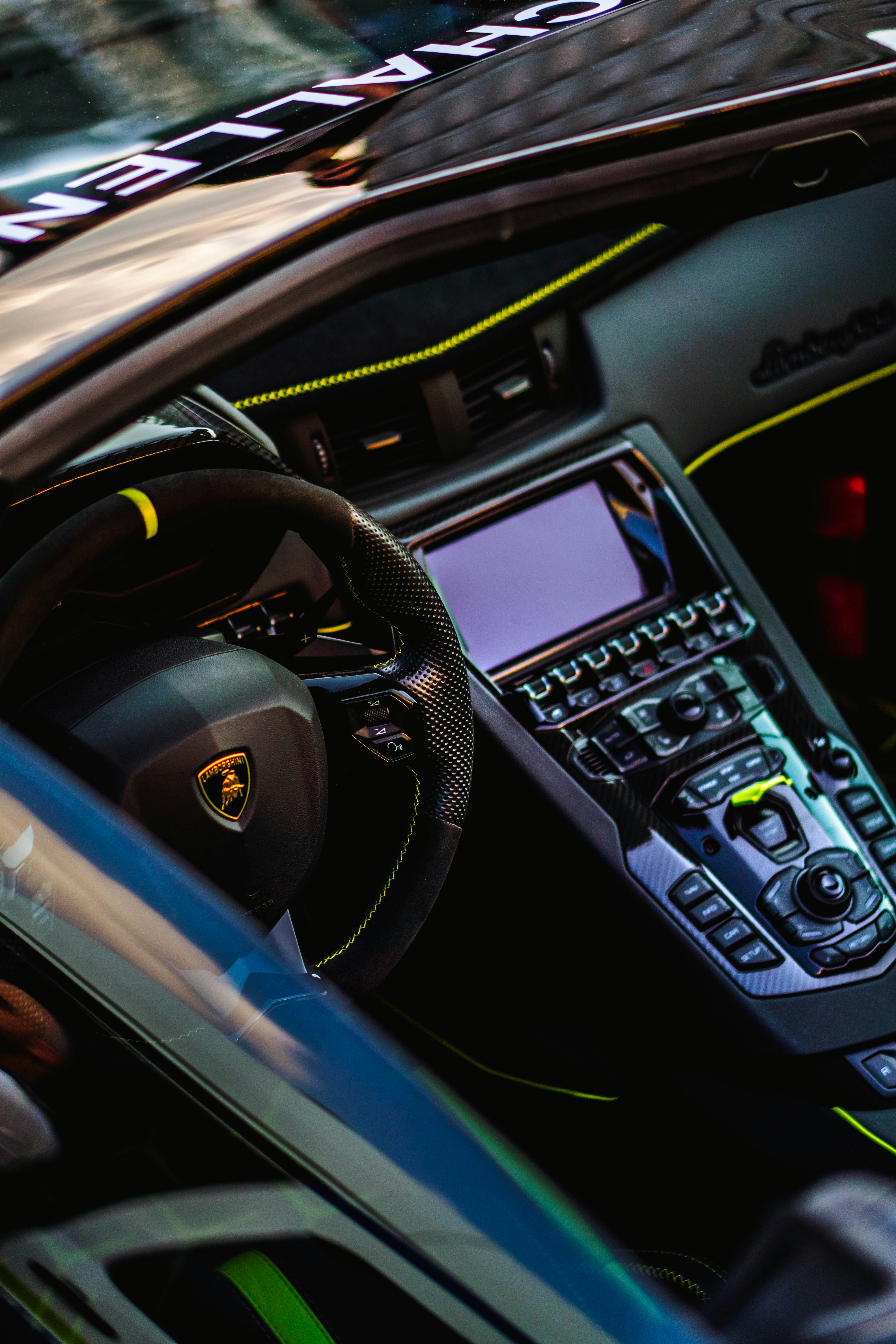 a close up of a car dashboard with a steering wheel