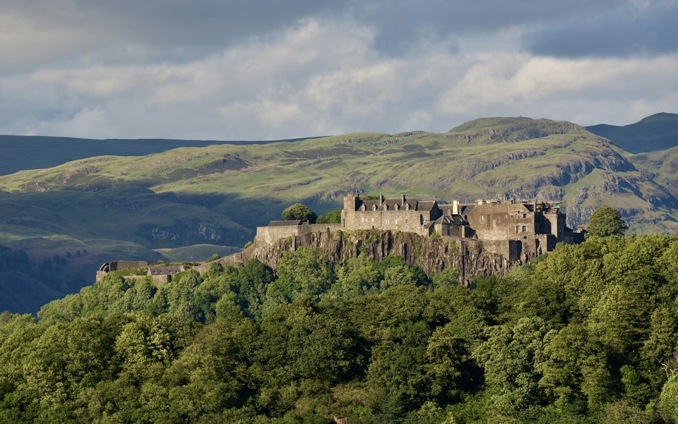 Stirling Castle perched on its crag above the Forth Valley toward the Highlands