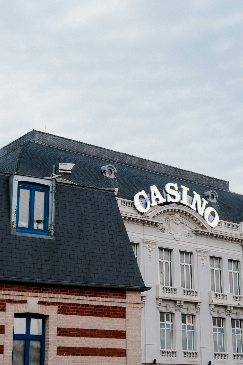a building with a casino sign on top of it
