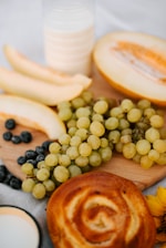A vibrant display of healthy pastries and fresh fruits arranged elegantly on a minimalist plate.