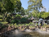 A peaceful garden featuring traditional elements symbolizing wellness and healing.