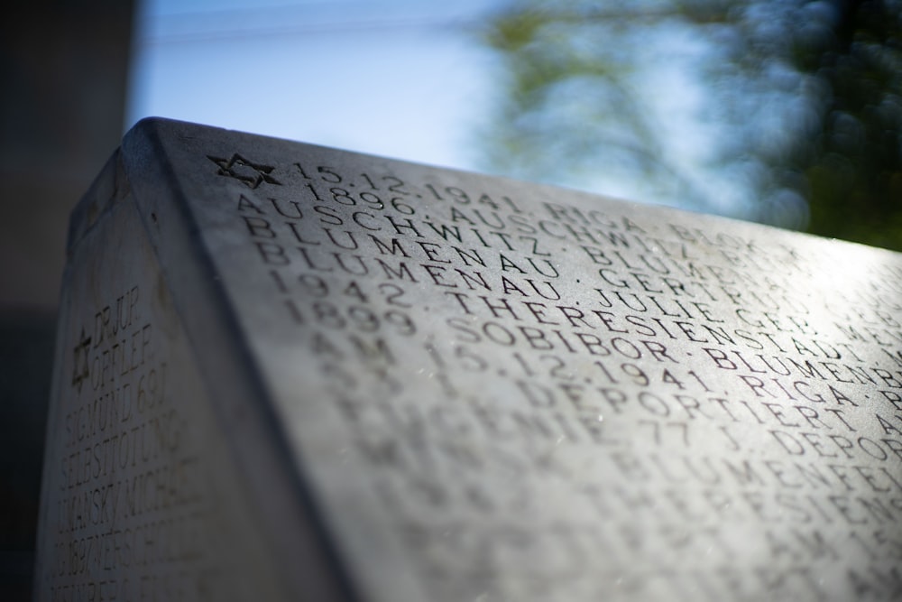 a close up of a monument with writing on it