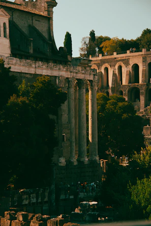 Ancient ruins bathed in warm golden light, inviting quiet reflection.