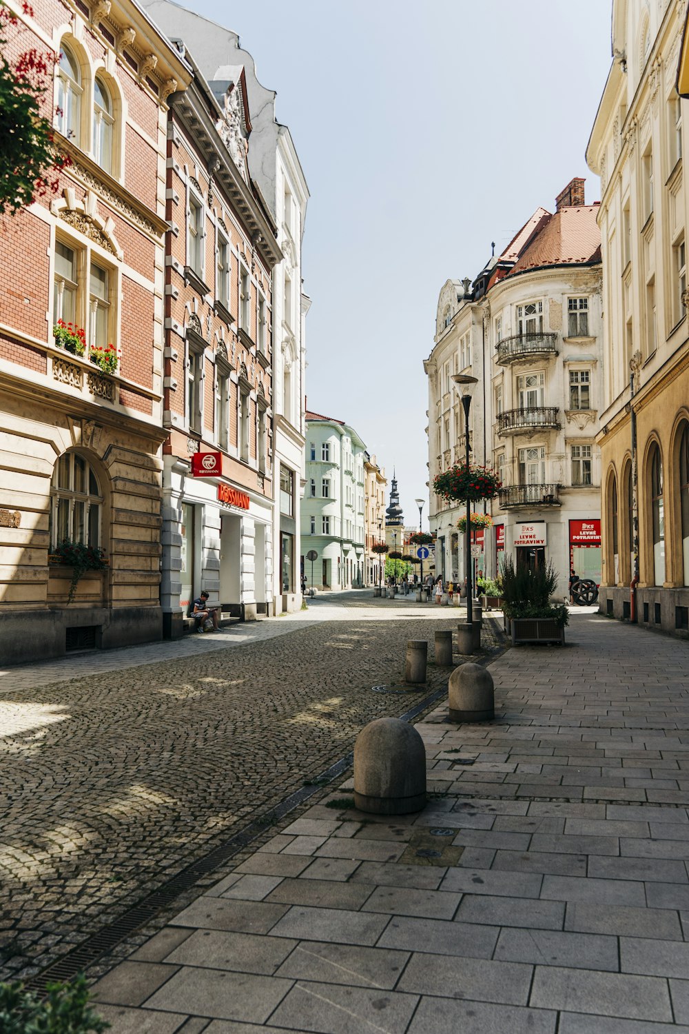 a cobblestone street in a european city