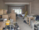 a room filled with lots of clutter and boxes