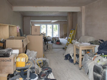 a room filled with lots of clutter and boxes