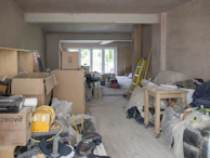 a room filled with lots of clutter and boxes