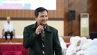 a man standing in front of a microphone