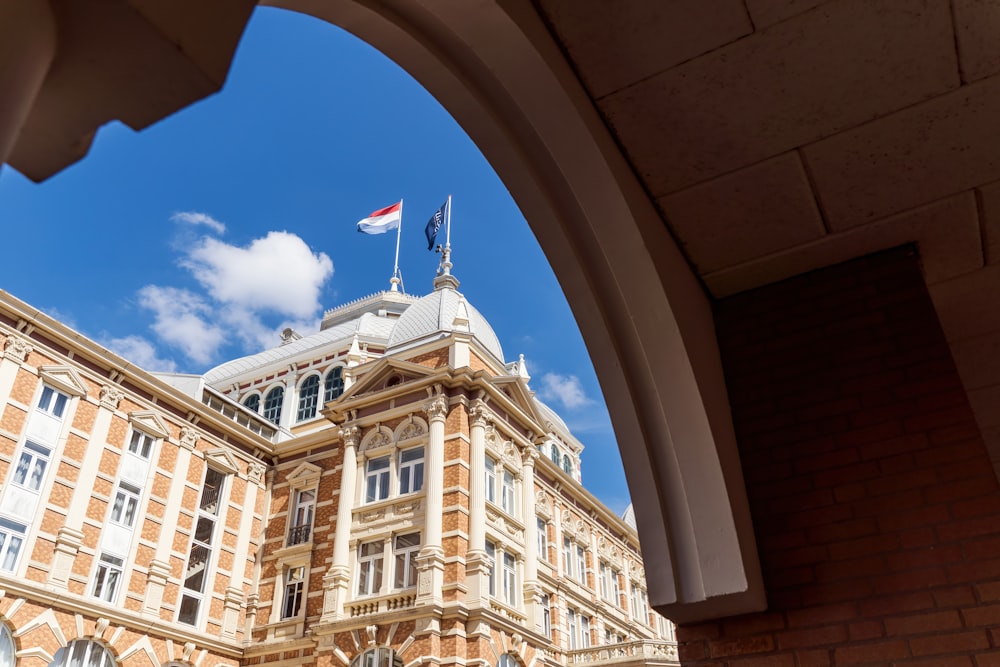 a large building with a flag on top of it