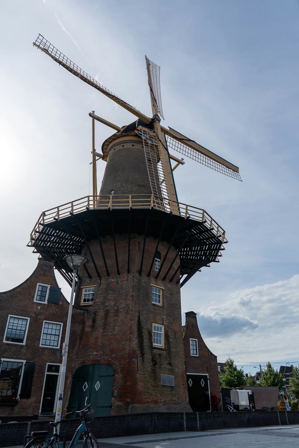 a windmill with a bicycle parked in front of it