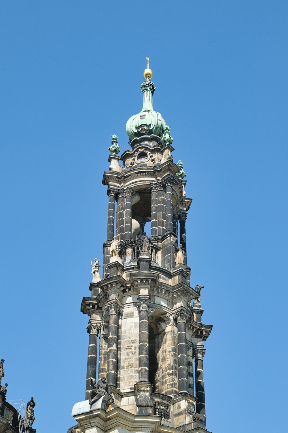 a tall clock tower with a sky background