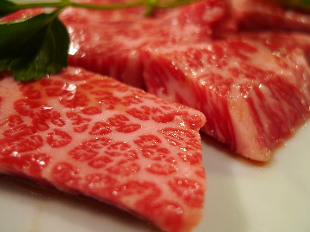 a close up of a plate of food with meat