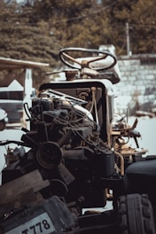 a truck with a bunch of junk on the back of it