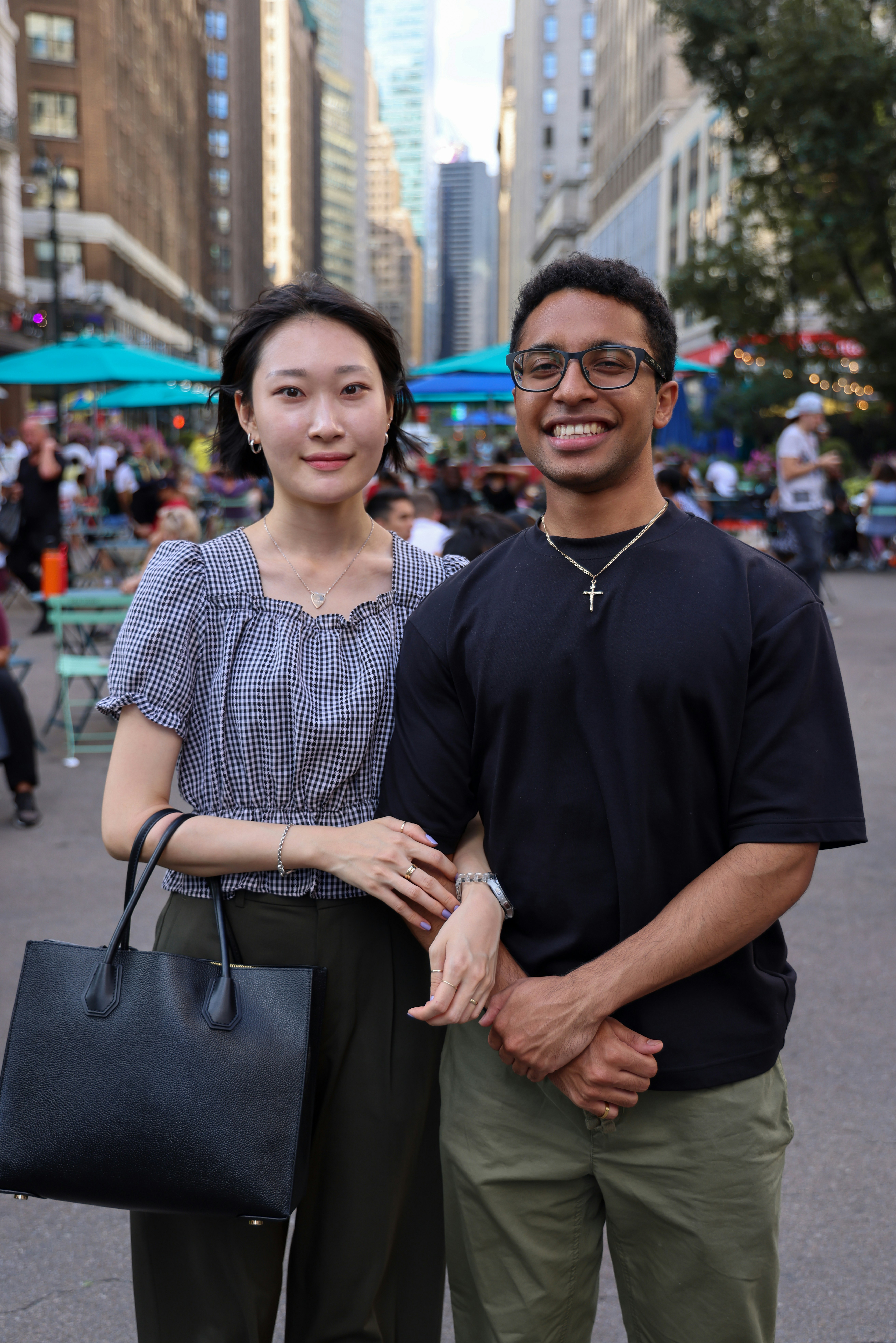 a man and a woman standing next to each other