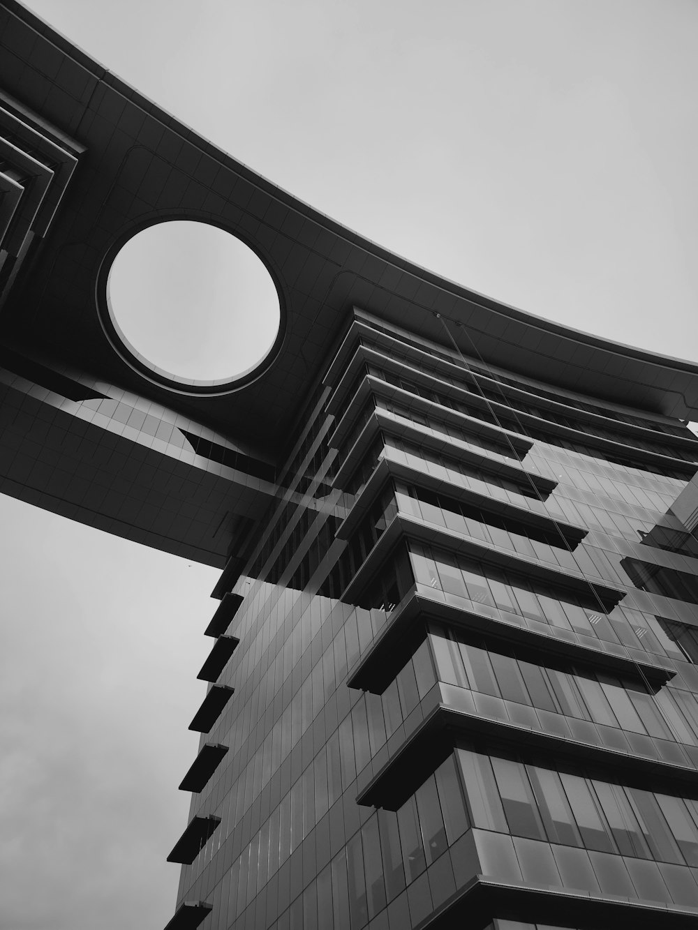 a black and white photo of a tall building