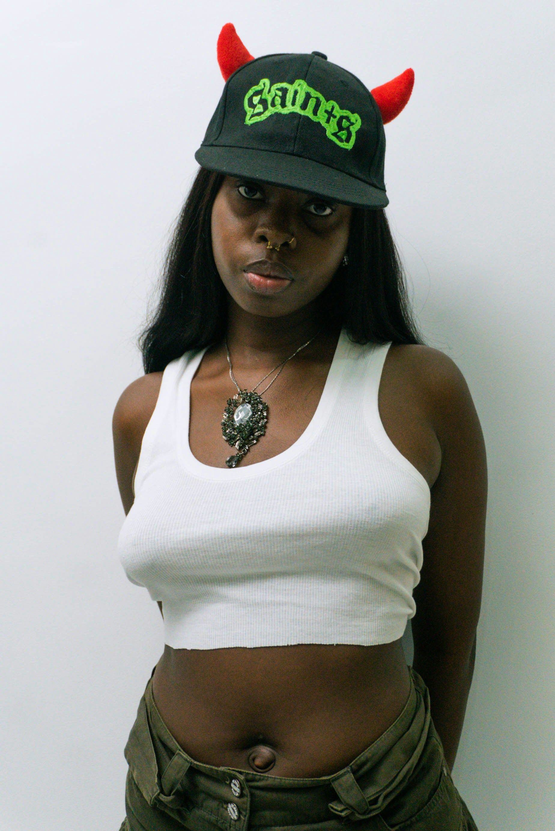 a woman wearing a hat with horns on it