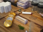 A collection of smoking accessories including grinders and trays.