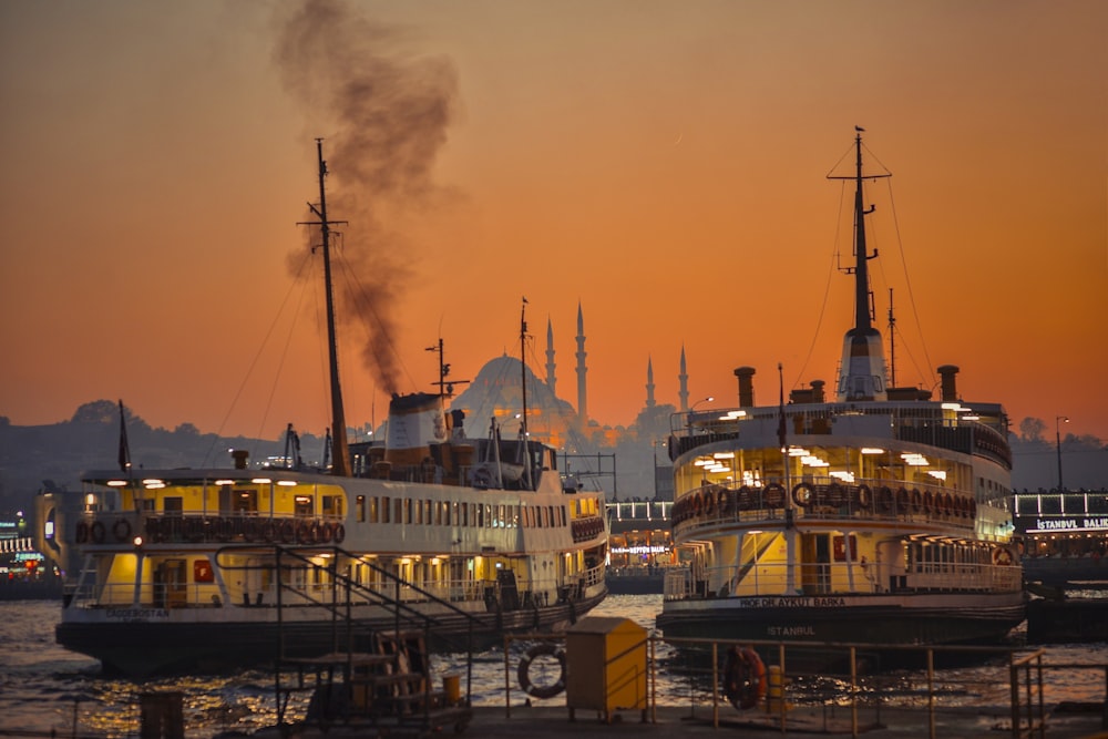 a couple of boats that are sitting in the water