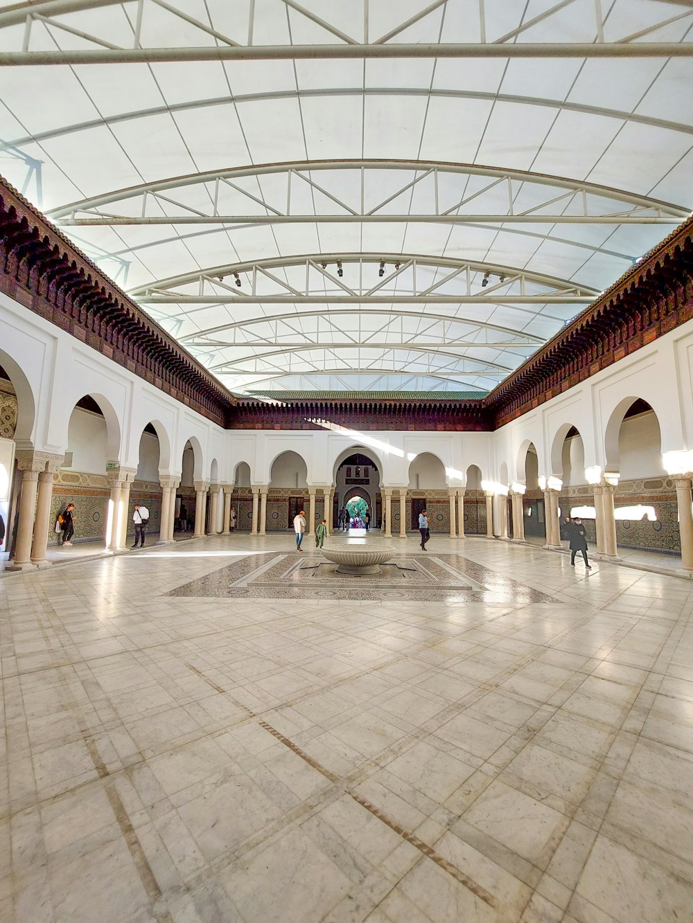 a large room with a ceiling that has arches and arches on it