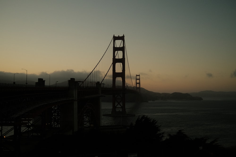 a view of the golden gate bridge at sunset