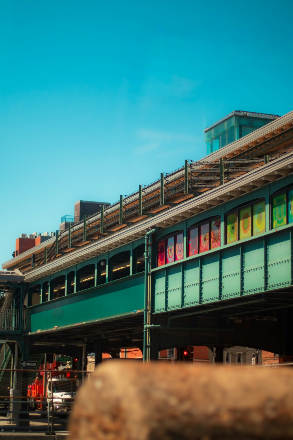 a train station with a train on the tracks