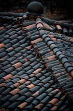 Close-up of the textured plastic tile roof showcasing its realistic traditional appearance.