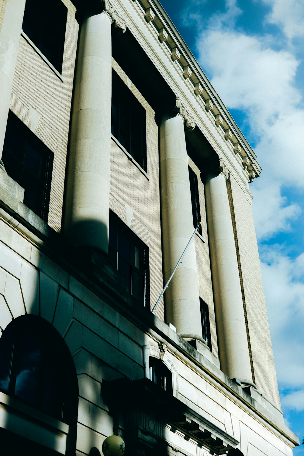 a tall building with a clock on the front of it