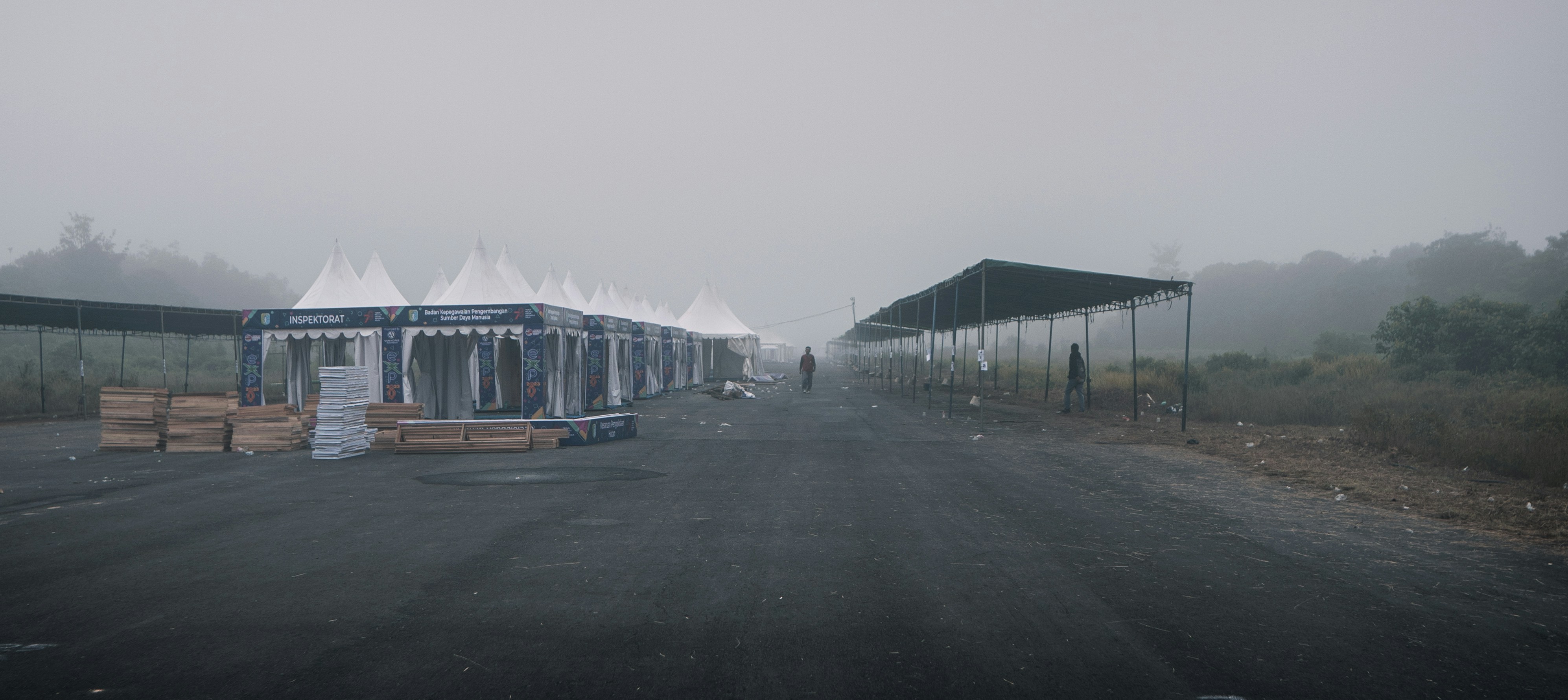 a row of tents sitting on the side of a road