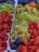 a table topped with lots of different types of fruit
