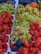 a table topped with lots of different types of fruit