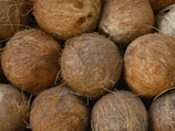 a pile of coconuts sitting on top of each other