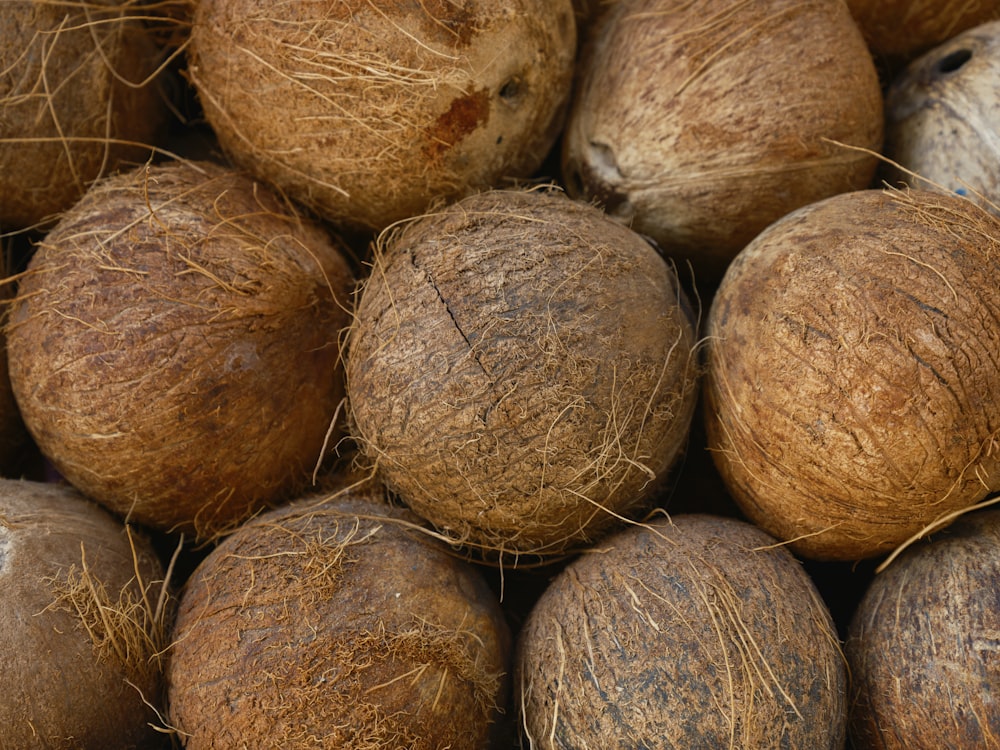 a pile of coconuts sitting on top of each other