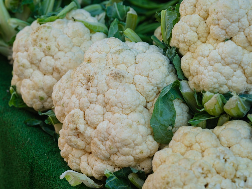 a close up of cauliflower on display for sale