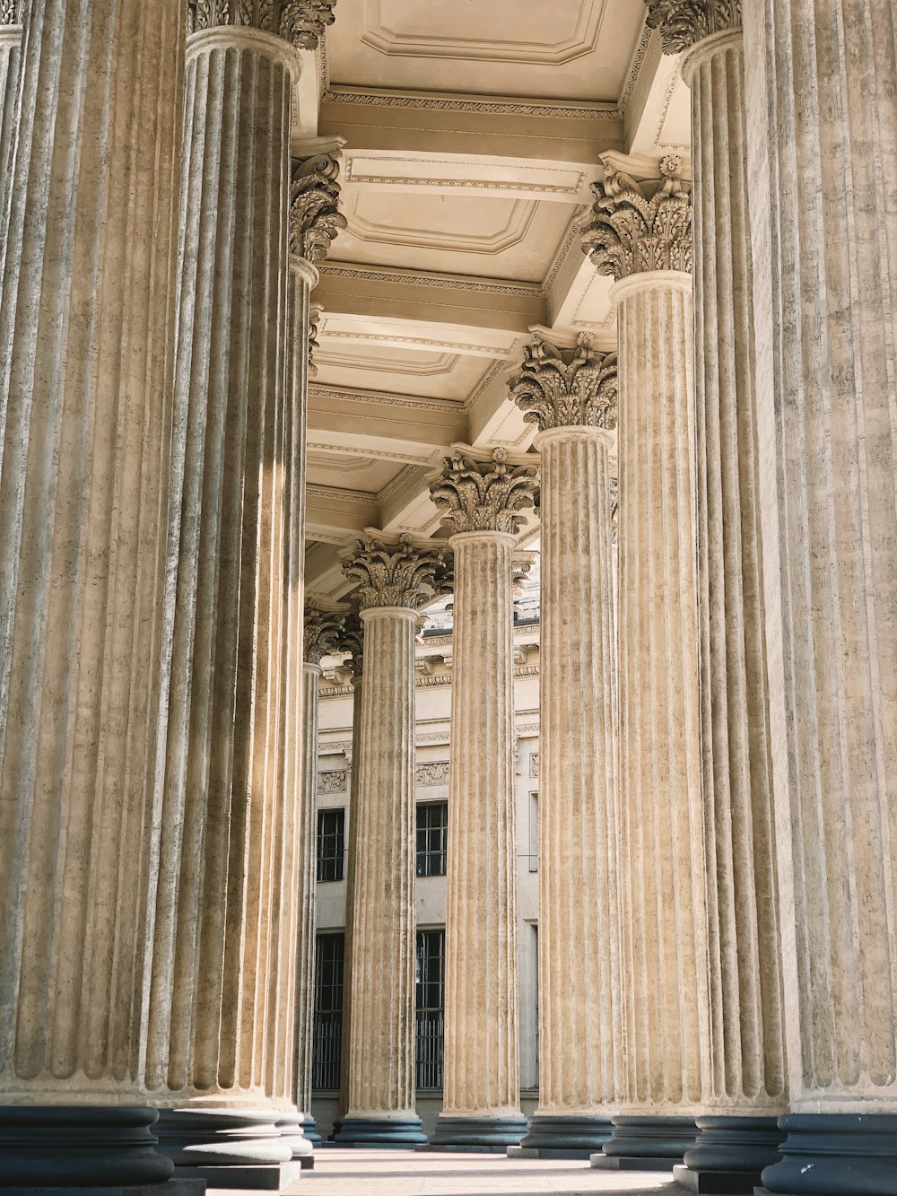 the columns of a building are lined with columns